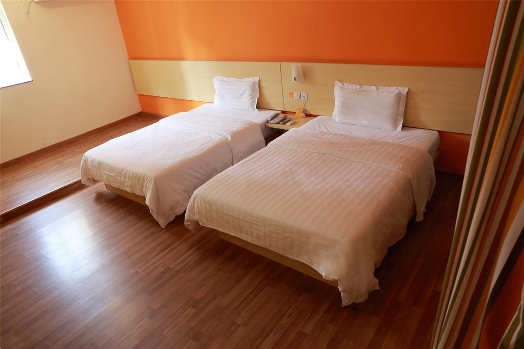 7Days Inn Qufu Sankong Csüfu Szoba fotó