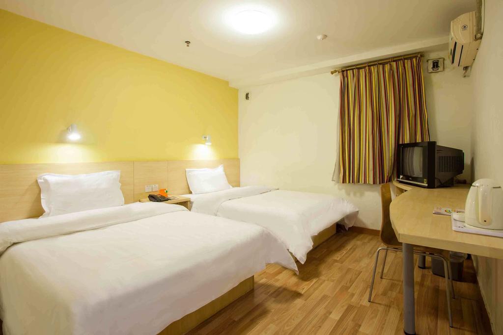 7Days Inn Qufu Sankong Csüfu Szoba fotó