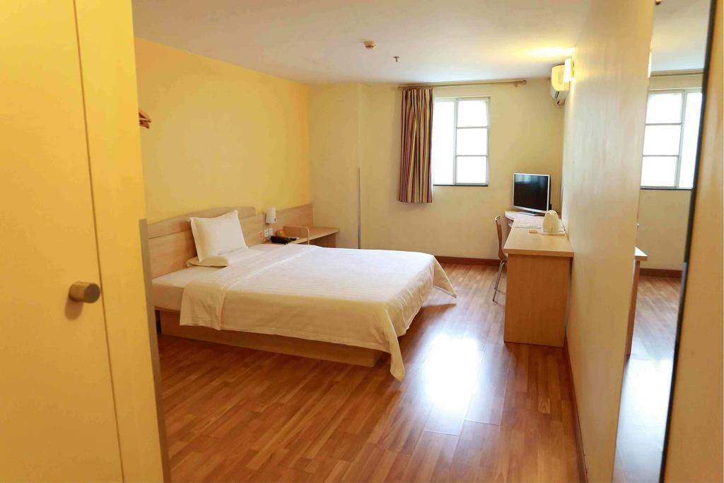 7Days Inn Qufu Sankong Csüfu Szoba fotó